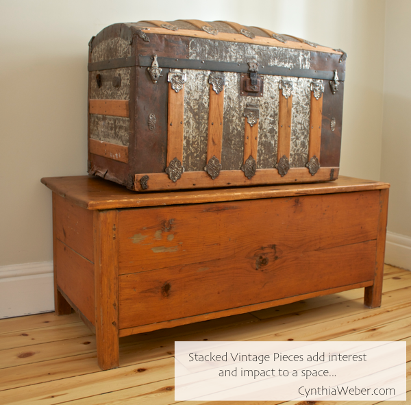 Stacked Vintage pieces add interest and impact to a space… CynthiaWeber.com
